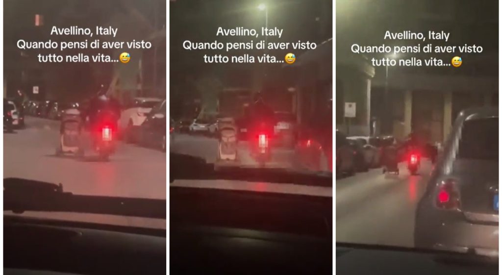 avellino uomo scooter trascina passeggino