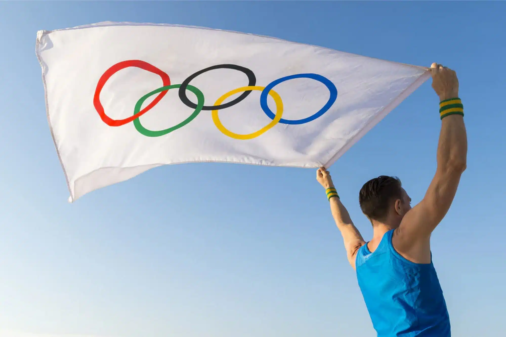 cosa rappresentano cinque cerchi bandiera olimpiadi storia significato